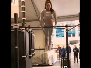 strong girl on the bar