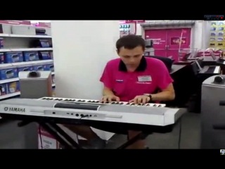 the seller plays the synthesizer